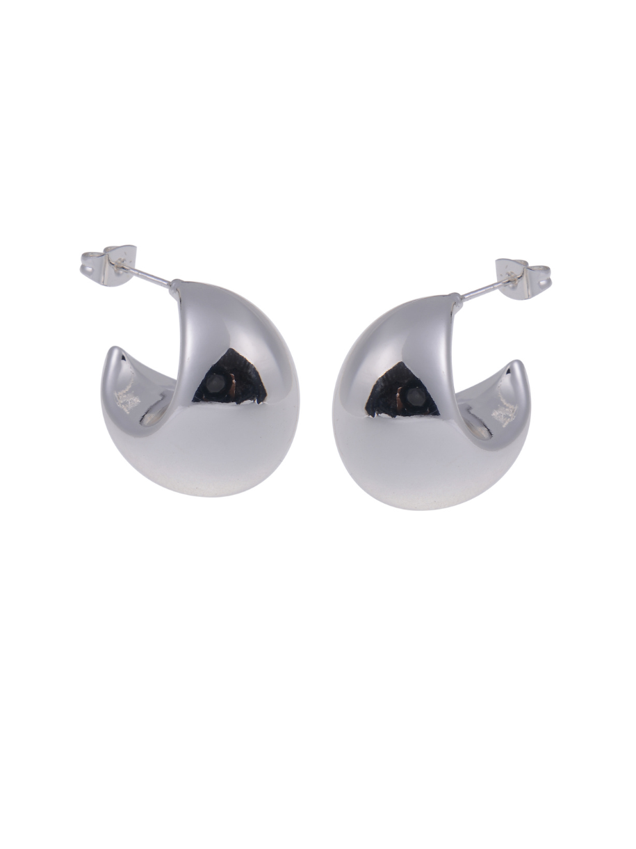 A pair of highly polished Silver Twilight Moon Hoops with a rounded shape are displayed on a white background.