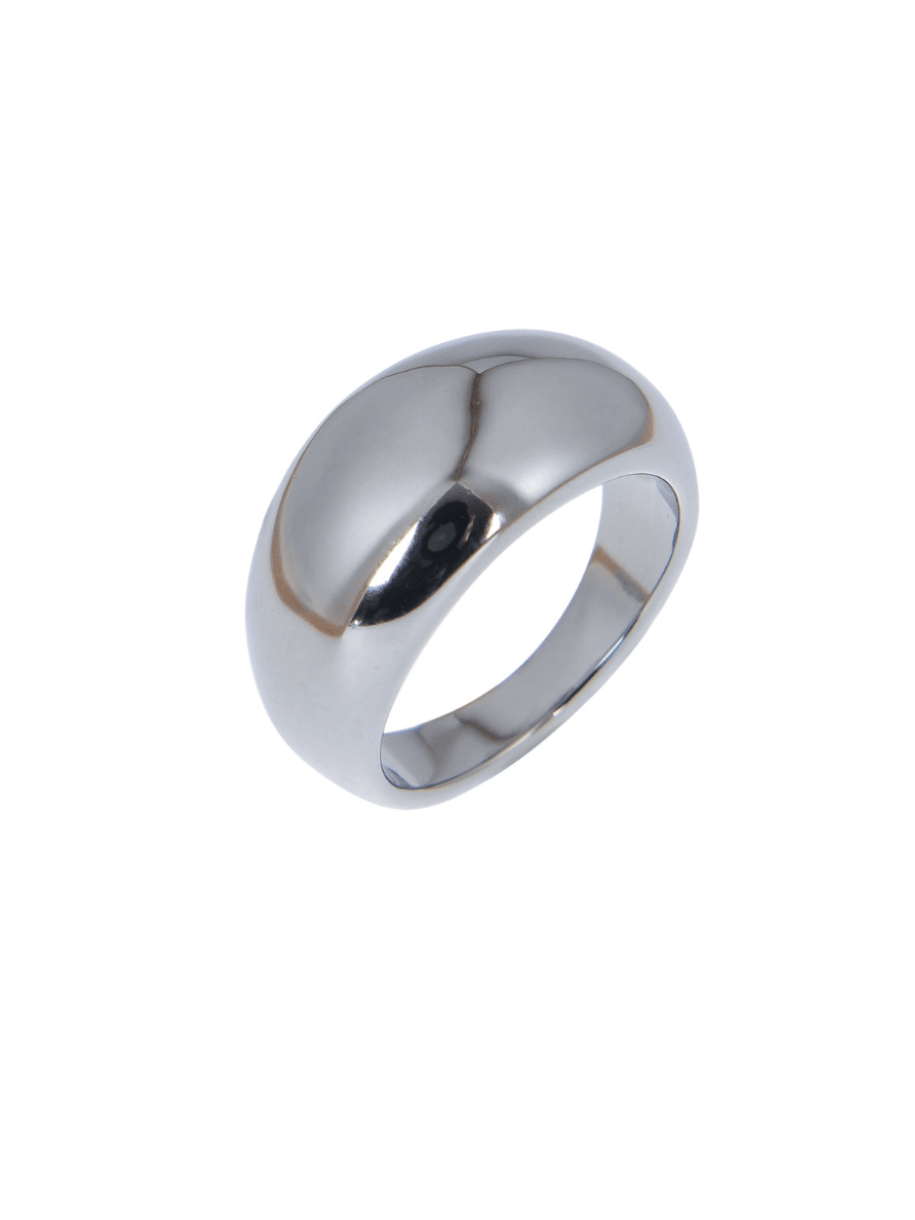 A shiny silver rings sits on a white background.