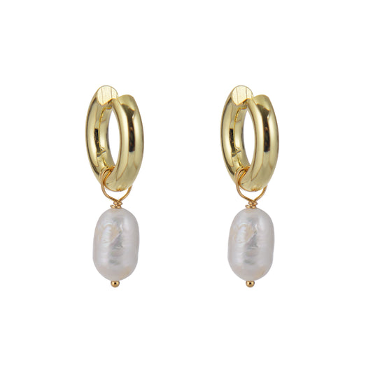 Pair of gold hoop earrings with pearl drops on a white background. earrings