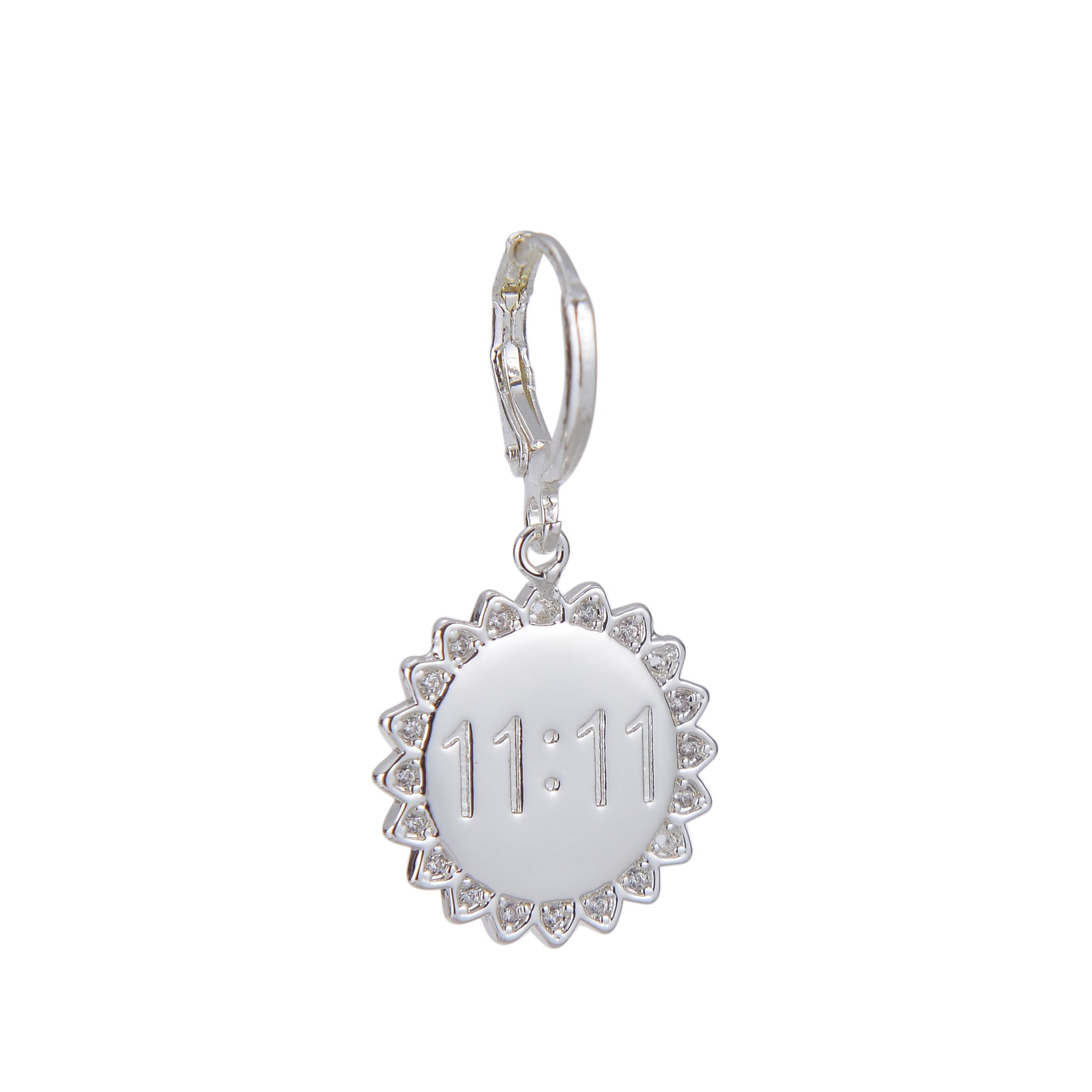Silver charm earring with a circular pendant engraved with "11:11" and surrounded by small gems.