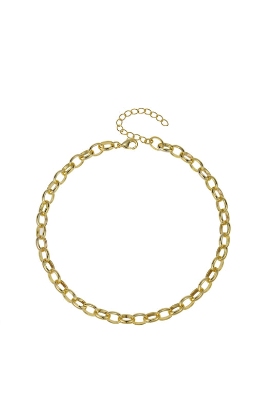 A gold-colored delicate necklace is displayed on a white background.