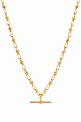 A gold chain necklace featuring a unique link design with knotted details and a horizontal bar pendant at the center, shown against a plain white background.