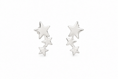 A pair of silver star-shaped stud earrings with three stars of varying sizes on each earring, displayed against a clean white background.