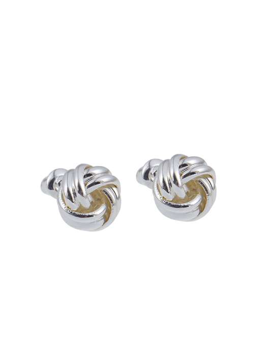 Two silver knot earrings on a white background.