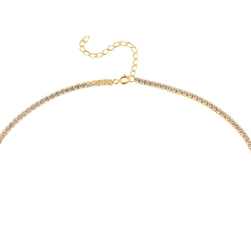 Close-up of a Celebrate:The Tennis Necklace, a gold-colored tennis necklace with an extender chain.