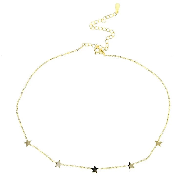 A gold chain delicate necklace features small star-shaped charms.