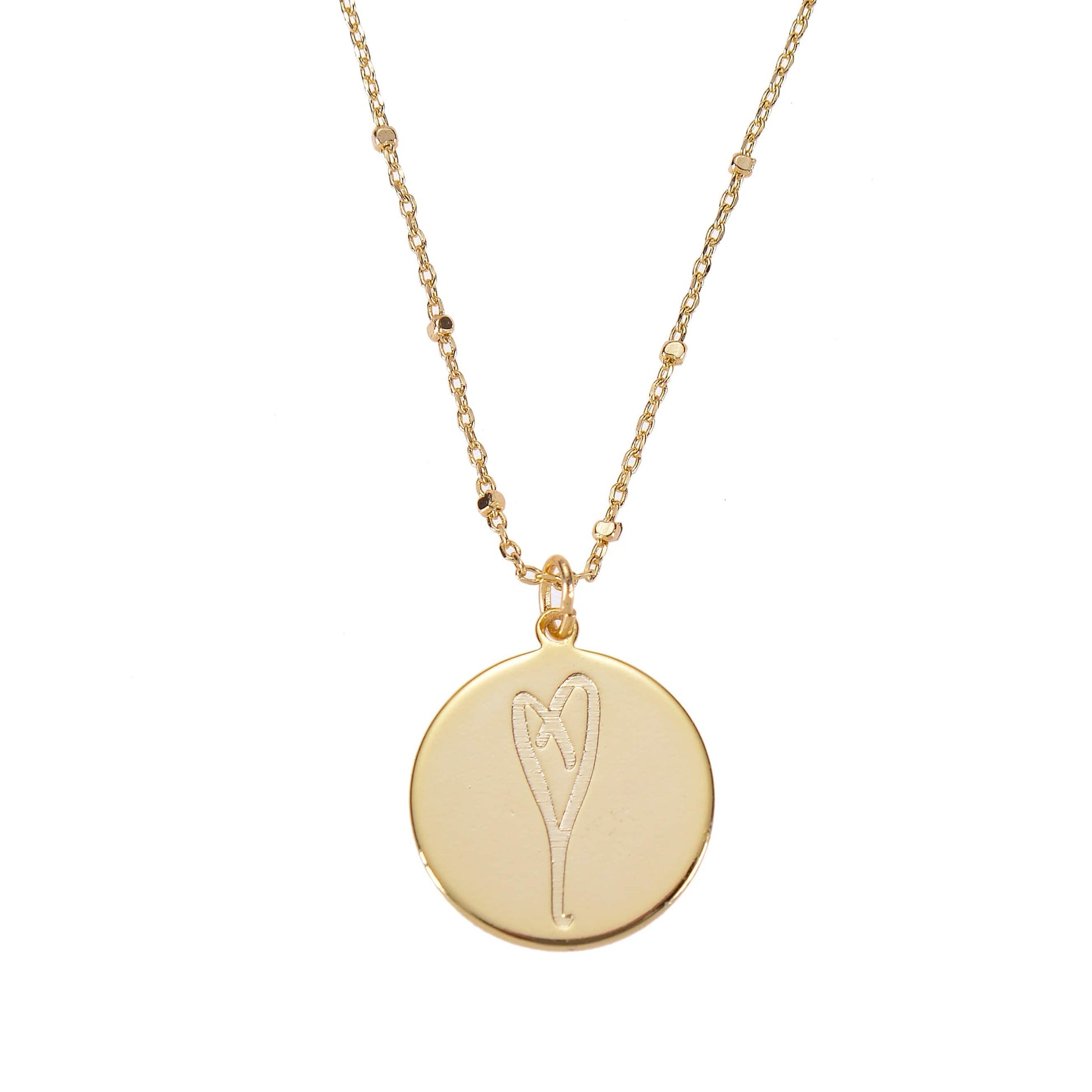 Engraved heart on a gold disc with a beaded chain necklace