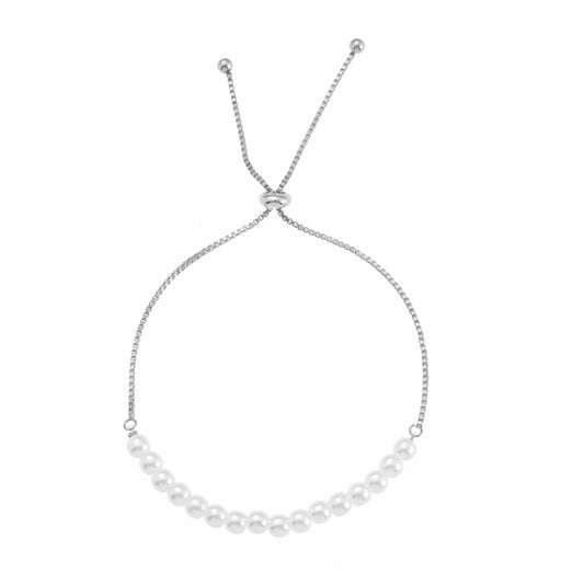 Silver chain bracelets with white pearls.