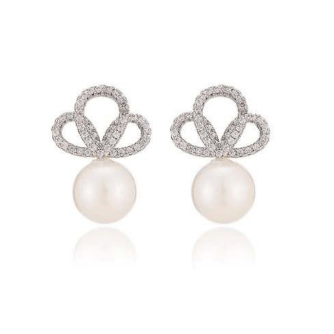 Two pearl earrings with crystal-covered tops on a white background.
