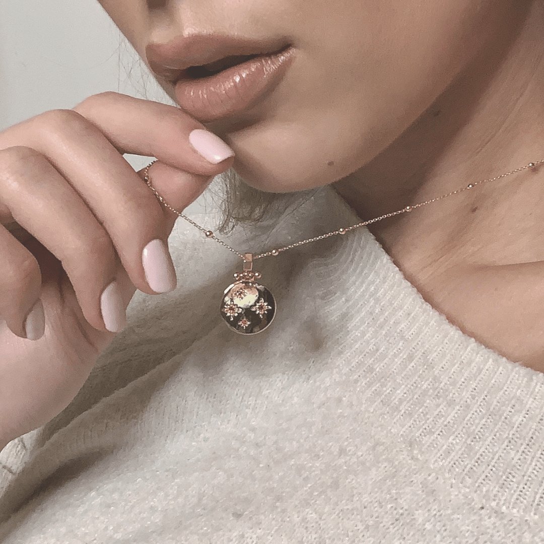 Woman wearing a January Birthstone Necklace.