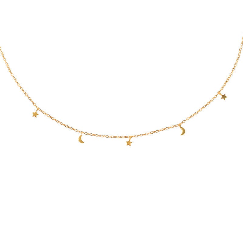 Gold-colored Celebrate: My Moon and Stars Necklace with star and moon charms.