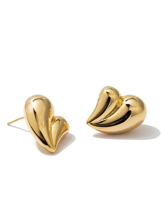 Two gold heart-shaped stud earrings on a white background.