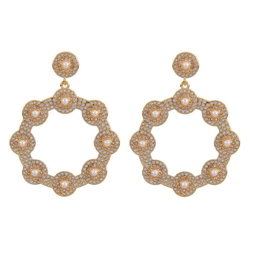 Gold earrings with pearl-like accents on a white background.