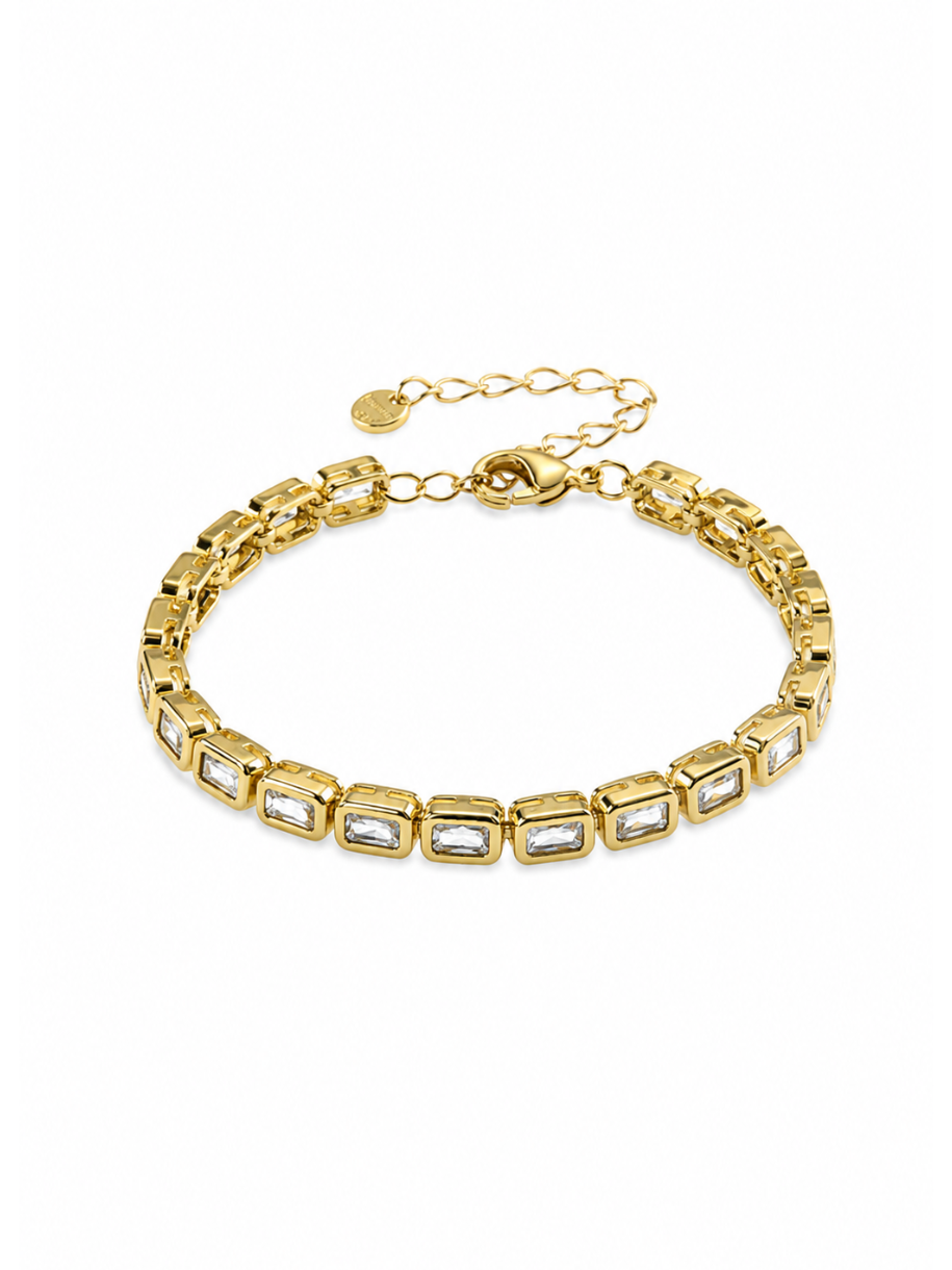 gold baguette tennis bracelet emerald cut crystals
close up gold tennis bracelet rectangular stones
sparkling baguette crystal bracelet gold