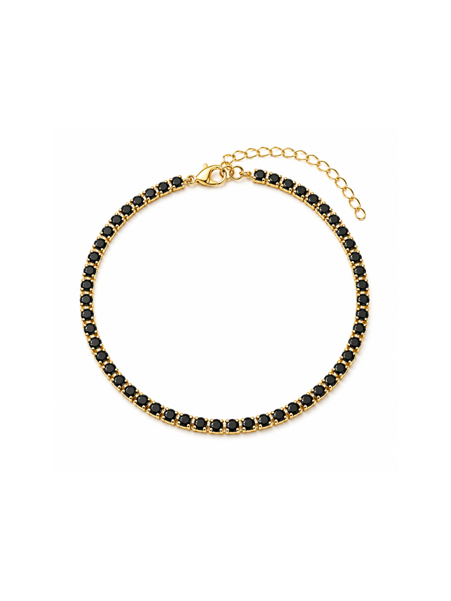 A gold chain bracelet featuring a continuous line of small, round black gemstones, displayed on a clean white background.
