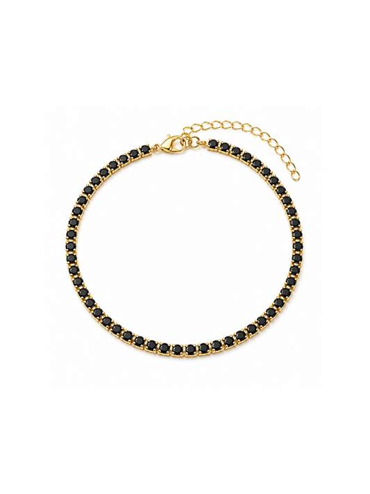 A gold chain bracelet featuring a continuous line of small, round black gemstones, displayed on a clean white background.