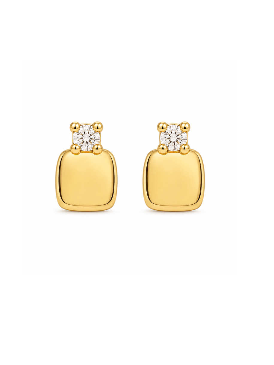 A pair of gold square stud earrings with a small round clear gemstone in a four-prong setting at the top, shown on a plain white background.