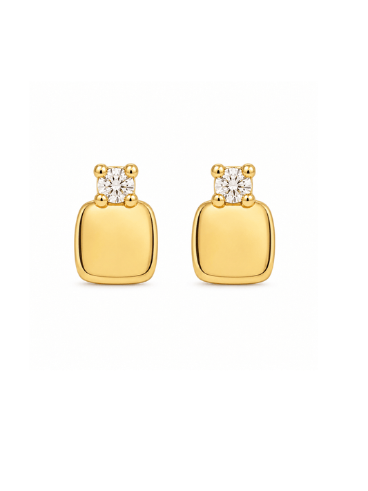 A pair of gold square stud earrings with a small round clear gemstone in a four-prong setting at the top, shown on a plain white background.