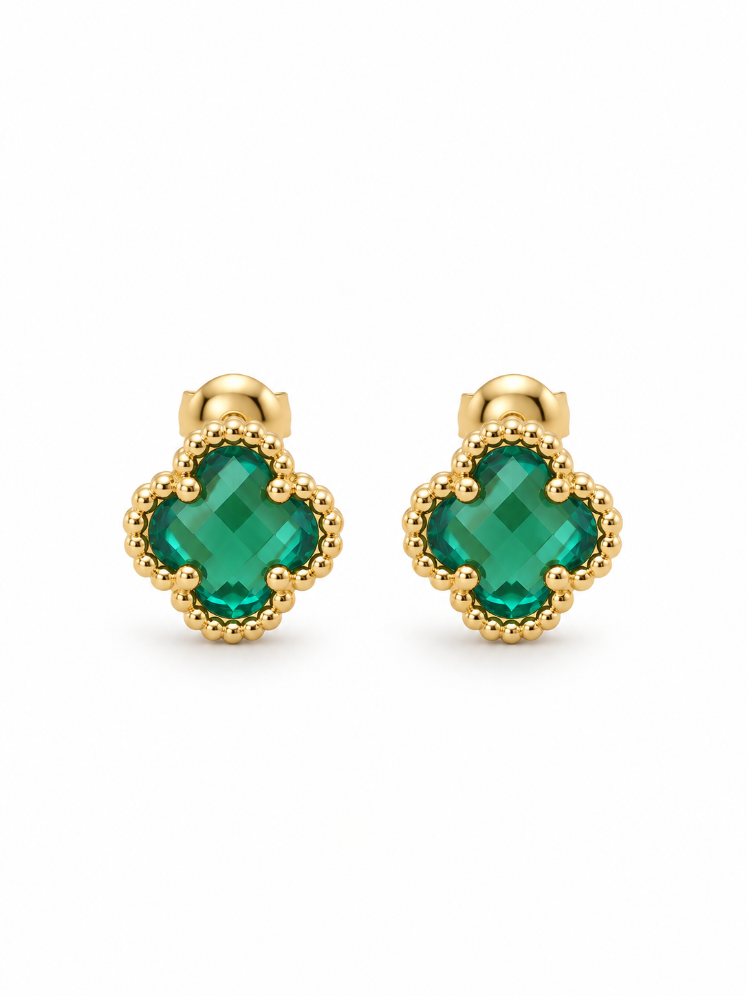 A pair of gold stud earrings featuring a faceted green clover-shaped gemstone in a beaded gold border setting, shown on a plain white background.
