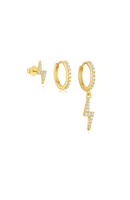 Three gold earrings: a lightning bolt stud, a jeweled hoop, and a jeweled hoop with a dangling lightning bolt earrings.