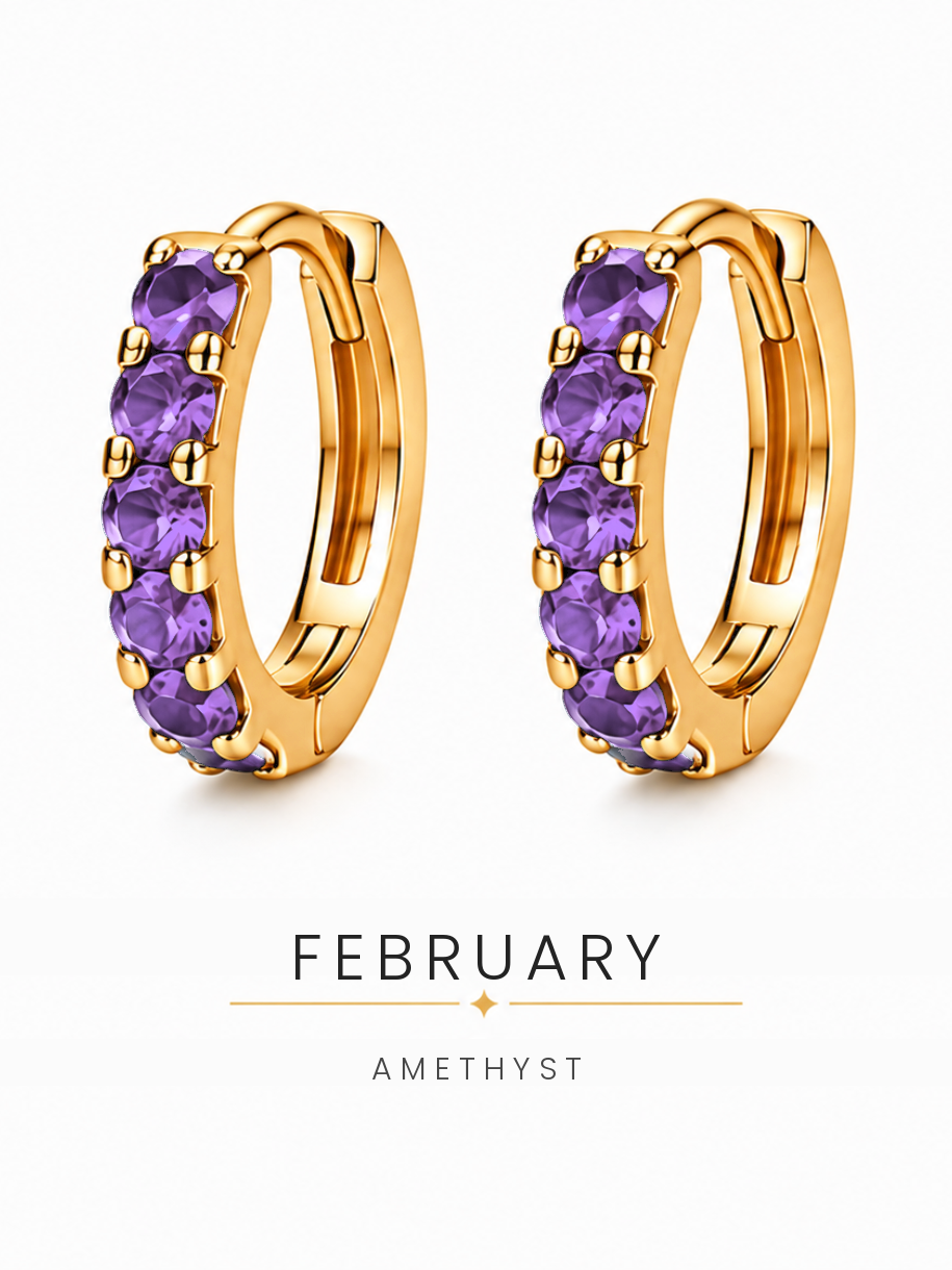 February birthstone gold huggie earrings featuring purple amethyst gemstones, birthstone jewellery