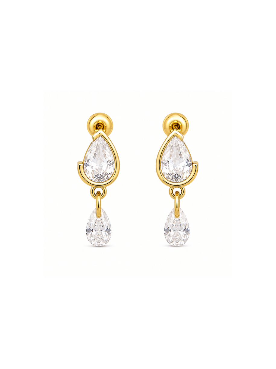 A pair of gold drop earrings with pear-cut clear gemstones, shown against a plain white background.