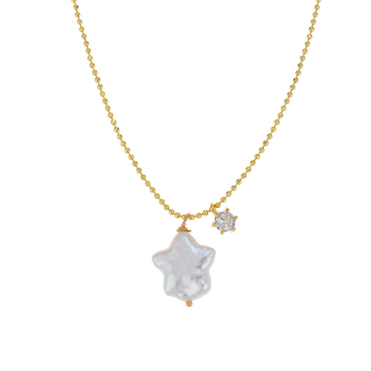 Gold delicate necklace with a baroque pearl star and a crystal charm.