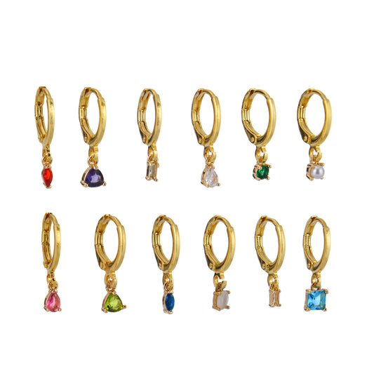 Gold-tone charm hoop earrings with colored stone pendants.