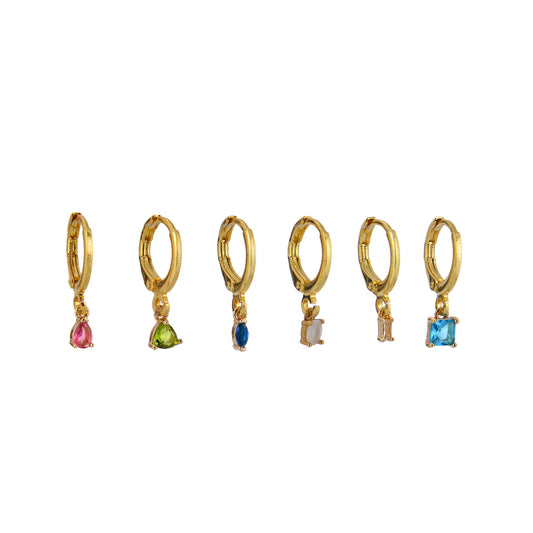 Six gold hoop earrings with colorful Birthstone Charms.