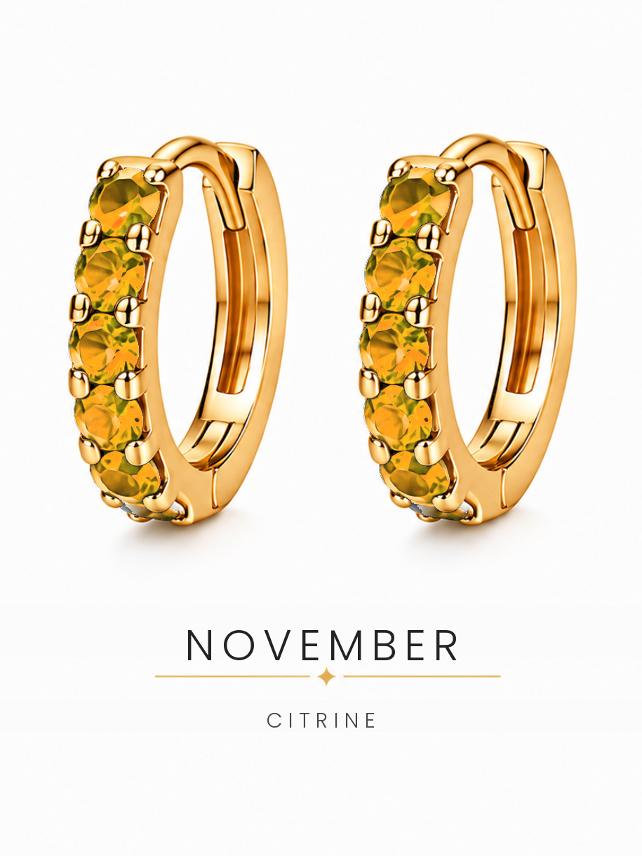 November birthstone gold huggie earrings featuring warm golden citrine gemstones, birthstone jewellery
