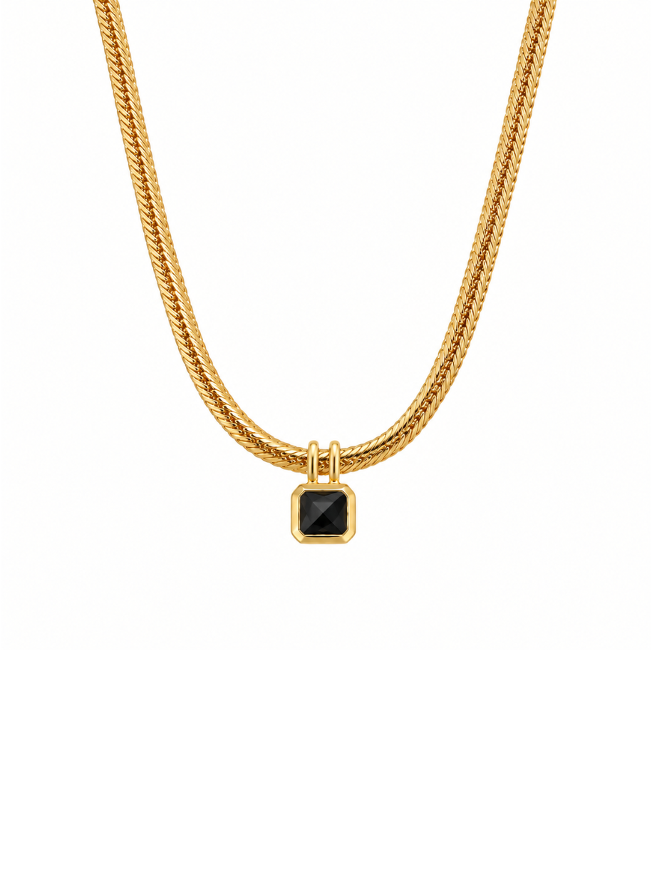 Onyx Bezel Square Pendant in gold with a faceted black stone on herringbone chain