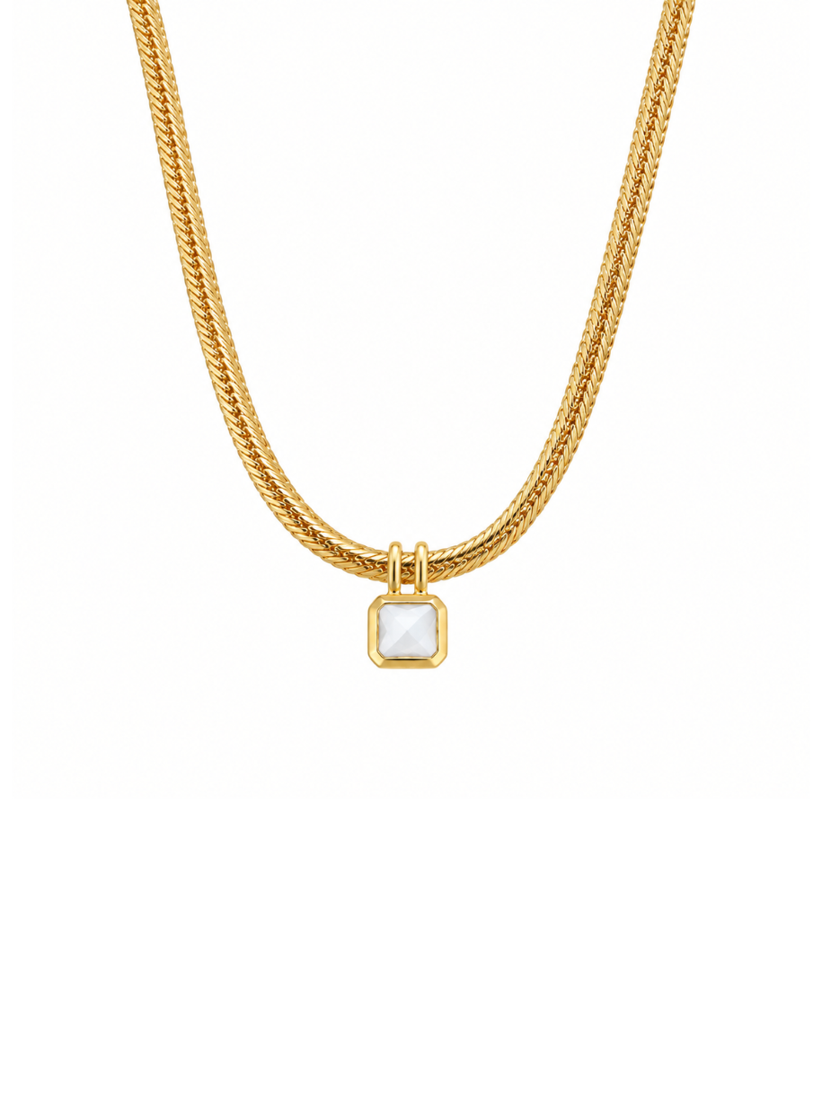 A gold chain necklace featuring a small square pendant with a white mother-of-pearl inlay, set against a plain white background.