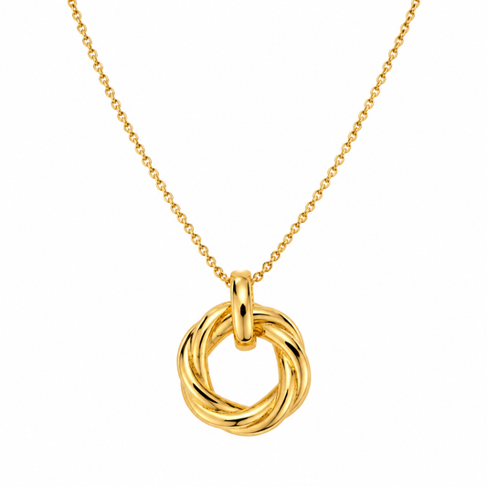 A gold necklace featuring a twisted knot pendant on a delicate gold chain, set against a solid white background.