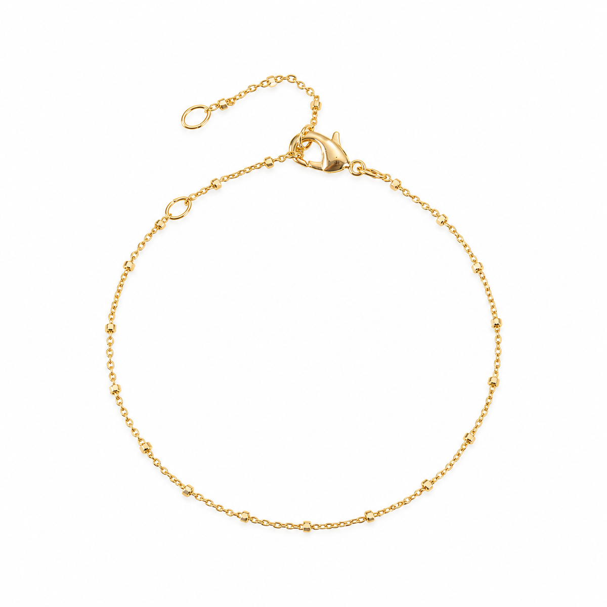 A delicate gold chain bracelet with a lobster clasp and extender ring, displayed on a clean white background.