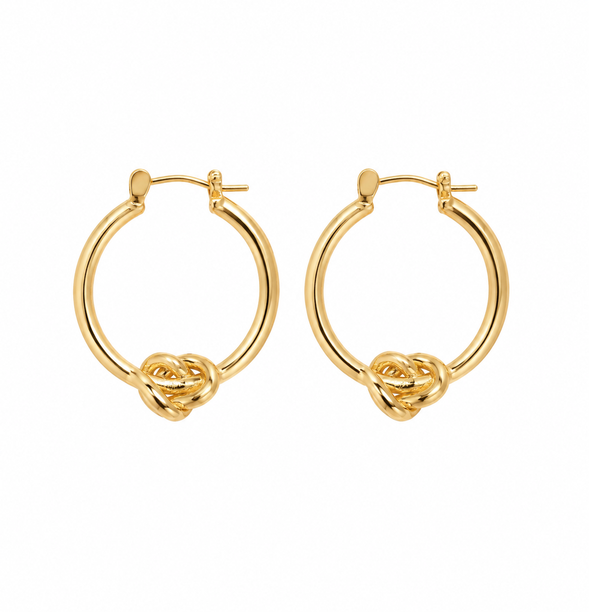 A pair of gold hoop earrings with a knotted detail at the bottom, shown on a plain white background.