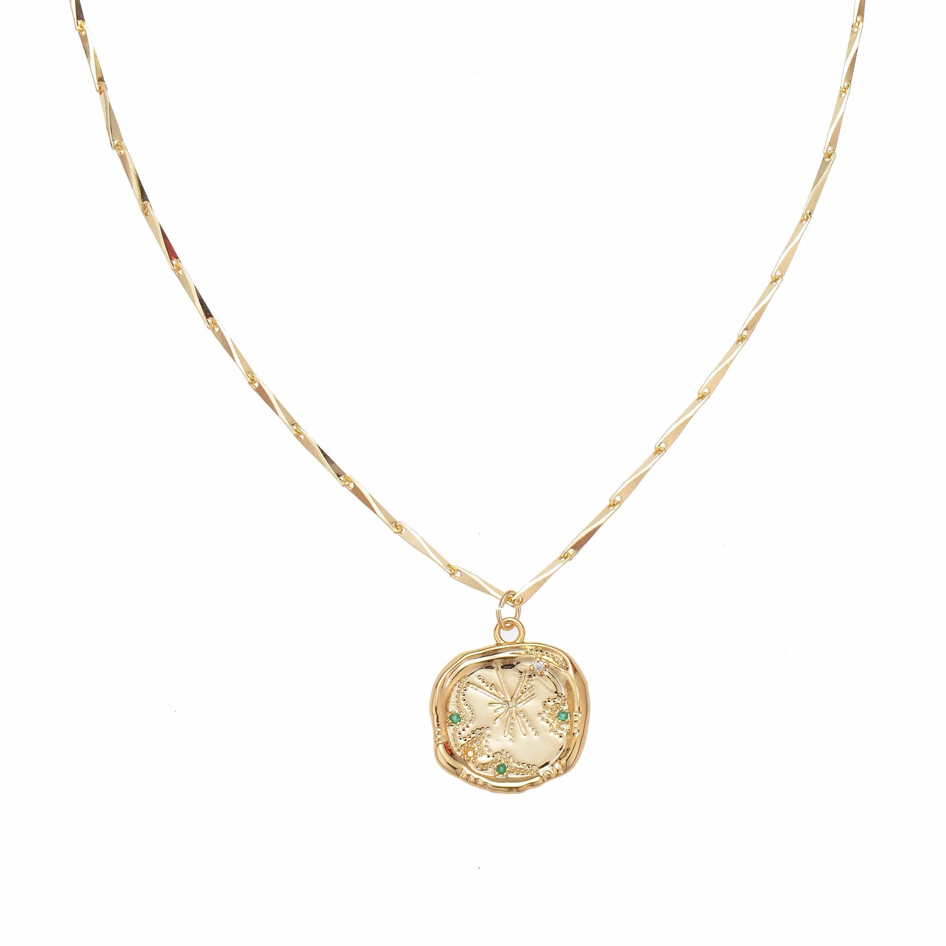 gold star coin pendant with gems